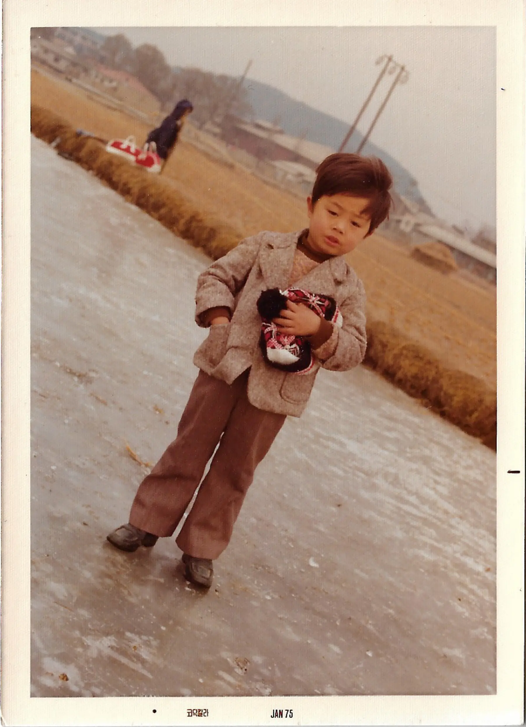 Tom as a child growing up in Seoul Korea