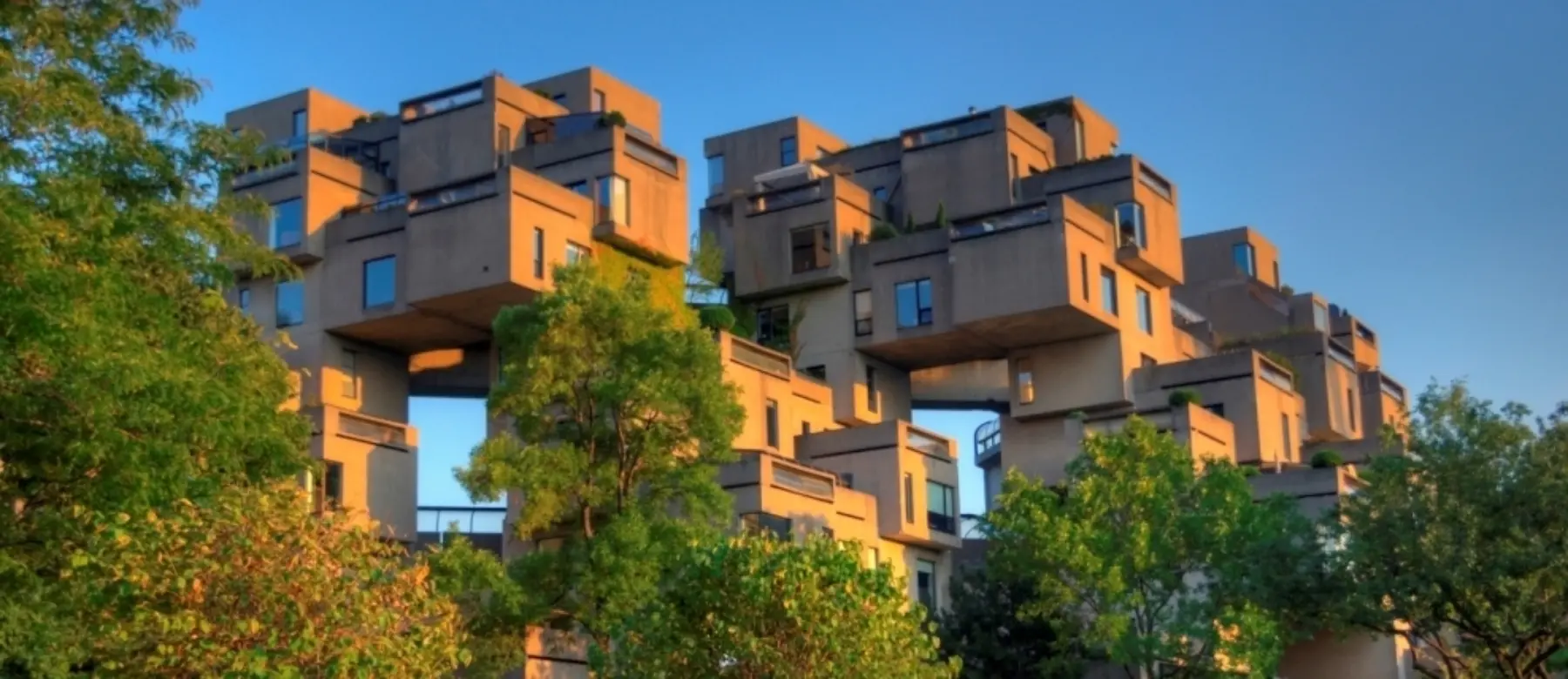 Habitat-67_side_view_with_holes_visible_in_the_structure-988x428